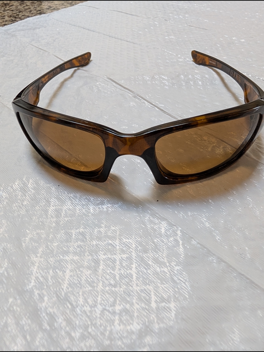 Oakley Tortoise Frame Sunglasses with Brown Lenses